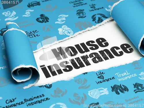 Image of Insurance concept: black text House Insurance under the piece of  torn paper