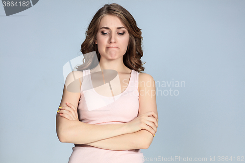 Image of The portrait of a beautiful sad girl closeup