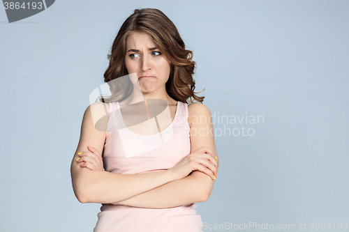 Image of The portrait of a beautiful sad girl closeup