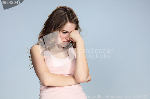 Image of The portrait of a beautiful sad girl closeup