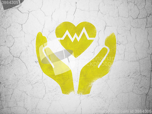 Image of Insurance concept: Heart And Palm on wall background