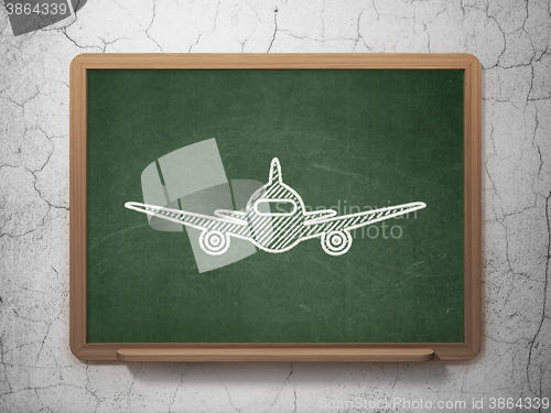 Image of Tourism concept: Aircraft on chalkboard background