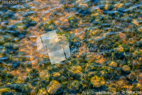 Image of Sludge stones sand.