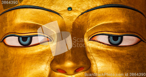 Image of Sakyamuni Buddha statue face close up