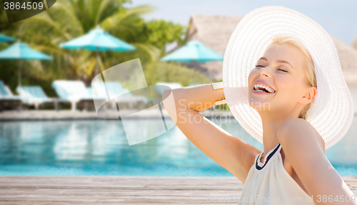 Image of beautiful woman enjoying summer over beach