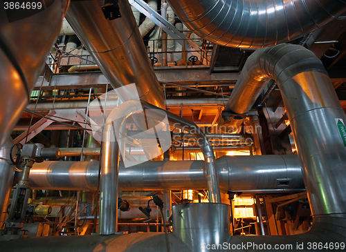 Image of Equipment, cables and piping as found inside of a modern industr