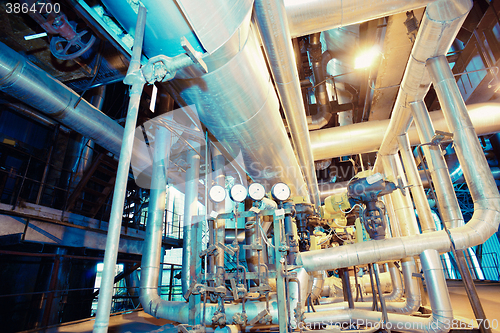 Image of Industrial zone, Steel pipelines, valves, cables and walkways