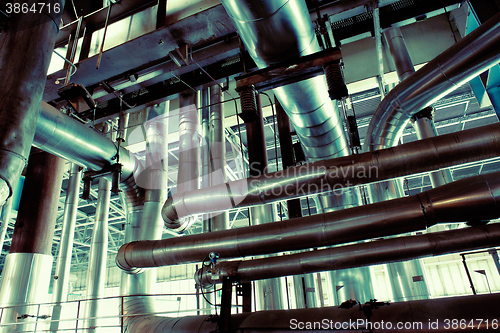 Image of Industrial zone, Steel pipelines, valves, cables and walkways