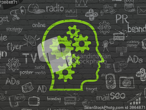 Image of Marketing concept: Head With Gears on wall background