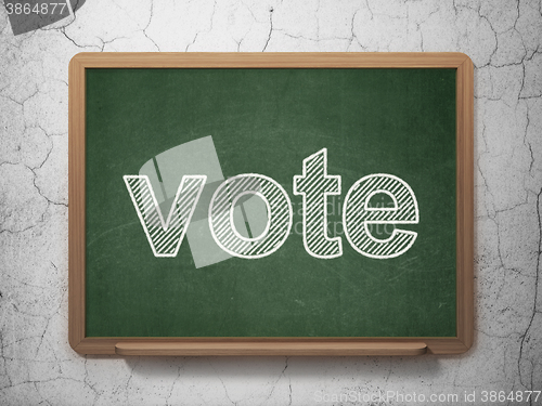 Image of Political concept: Vote on chalkboard background