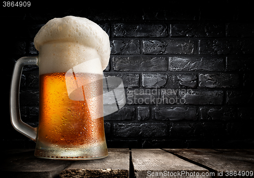 Image of Beer and brick wall