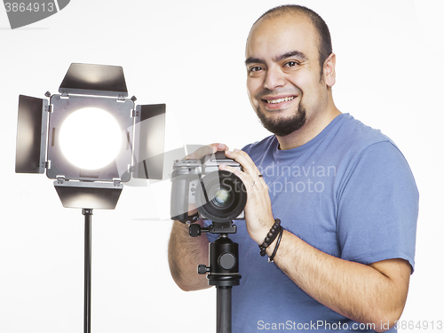 Image of professional photographer with photographic equipment