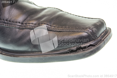 Image of Old black shoe