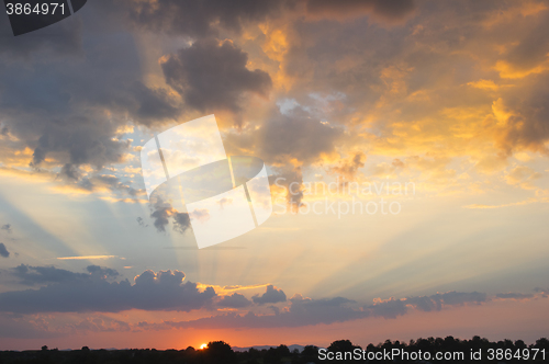 Image of Sunbeam ray light over the sky