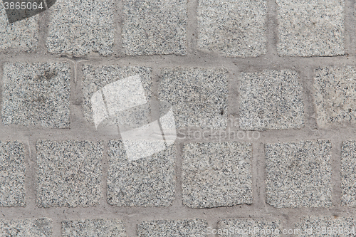 Image of close up of paving stone or facade tile texture