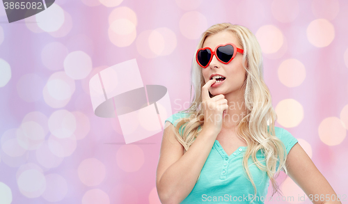 Image of happy young blonde woman or teenager in sunglasses