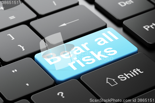 Image of Insurance concept: Bear All Risks on computer keyboard background