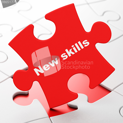 Image of Education concept: New Skills on puzzle background