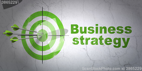 Image of Business concept: target and Business Strategy on wall background