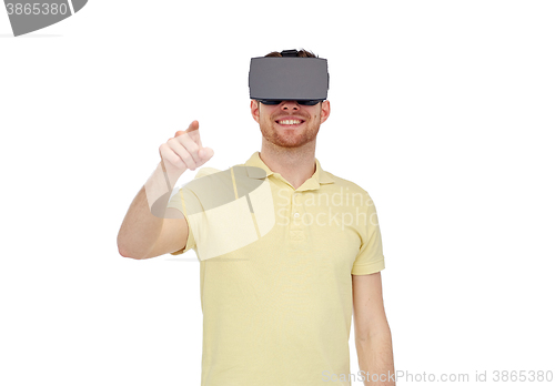 Image of happy man in virtual reality headset or 3d glasses