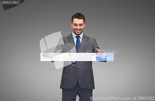 Image of businessman working with internet search bar