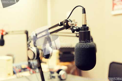 Image of microphone at recording studio or radio station