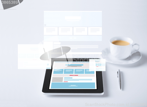 Image of close up of tablet pc with web design template