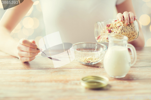 Image of close up of woman eating muesli for breakfast