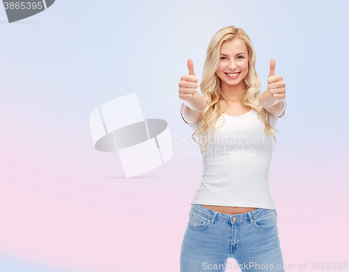 Image of happy young woman or teenage girl in white t-shirt