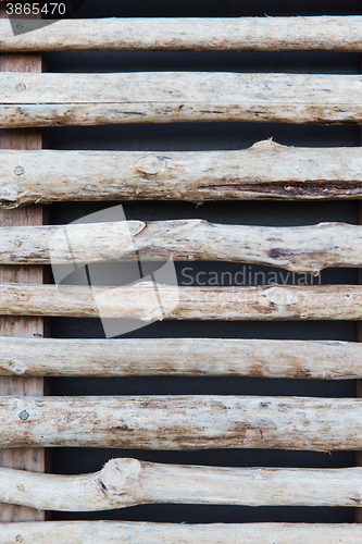 Image of fence or shutters of wooden sticks