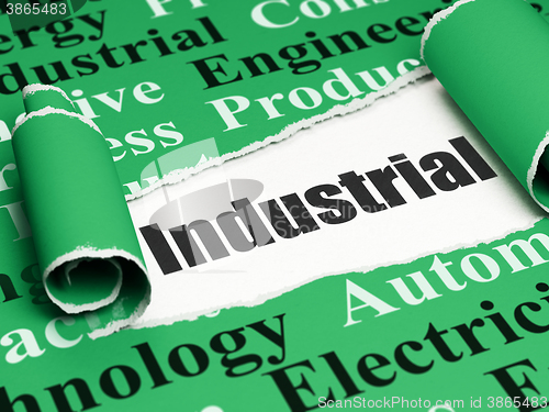 Image of Industry concept: black text Industrial under the piece of  torn paper