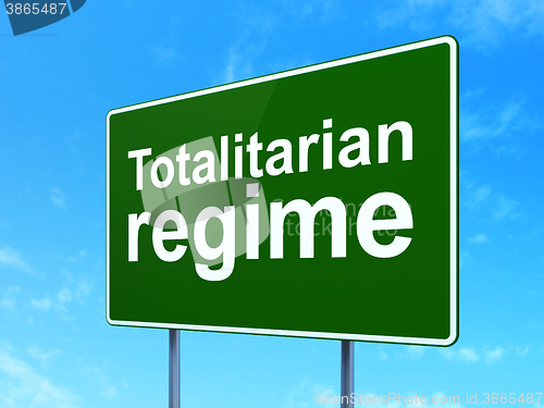 Image of Politics concept: Totalitarian Regime on road sign background