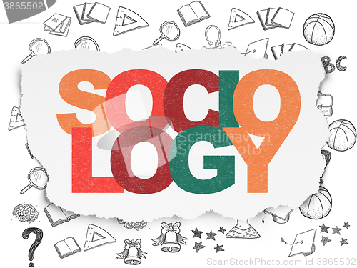 Image of Studying concept: Sociology on Torn Paper background