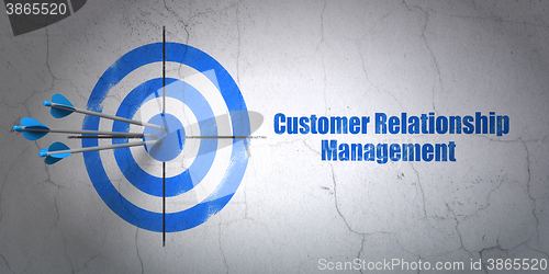 Image of Advertising concept: target and Customer Relationship Management on wall background