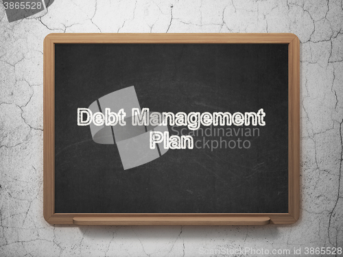 Image of Finance concept: Debt Management Plan on chalkboard background