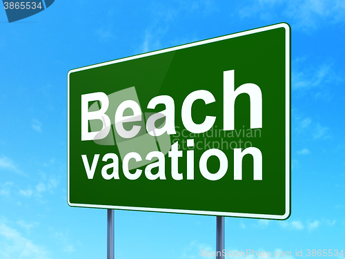 Image of Tourism concept: Beach Vacation on road sign background