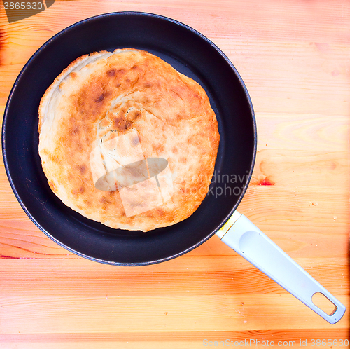 Image of pita bread in a pan