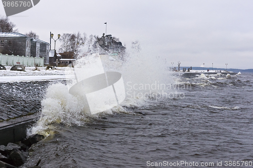 Image of Stormy lake quay in winter