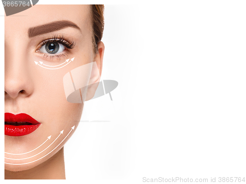 Image of The young female face. Antiaging and thread lifting concept