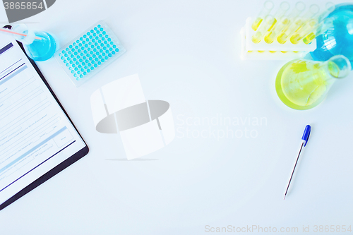 Image of close up of scientific laboratory table with stuff