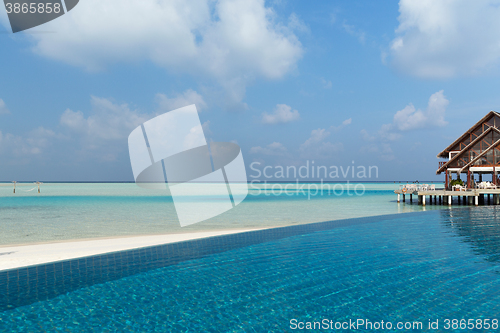 Image of patio or terrace with canopy on beach sea shore