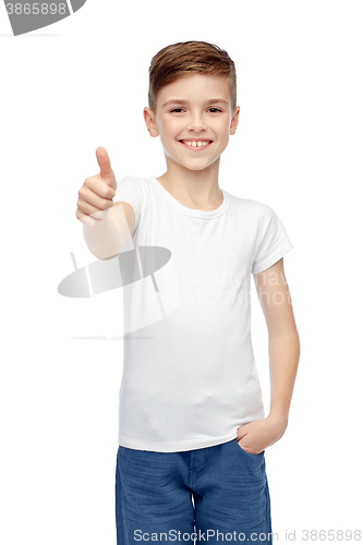 Image of happy boy in white blank t-shirt showing thumbs up
