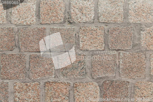 Image of close up of paving stone or facade tile texture