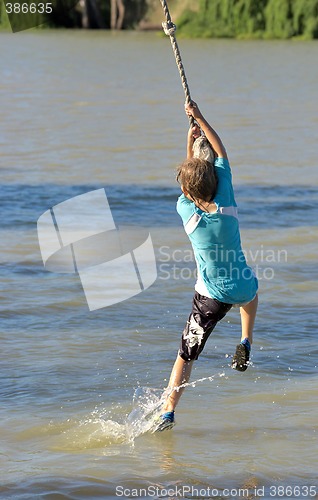 Image of boy on rope