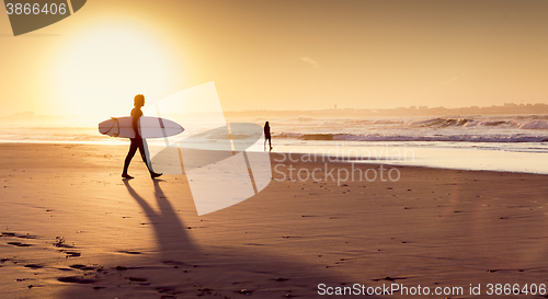 Image of Surfers on the beach