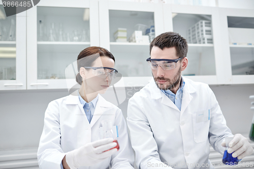 Image of young scientists making test or research in lab