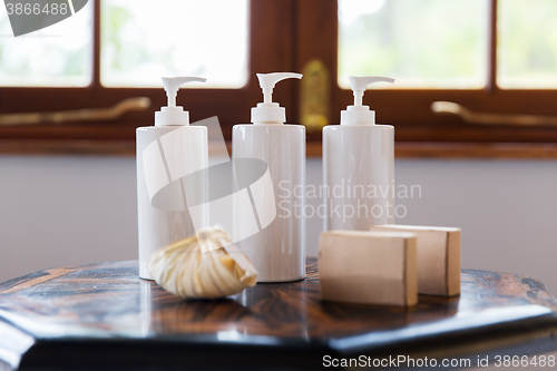 Image of close up of liquid soap or body lotion at bathroom