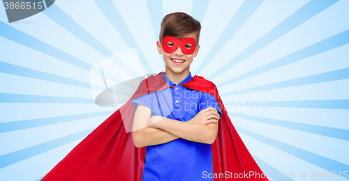 Image of boy in red super hero cape and mask