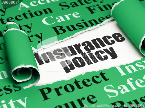 Image of Insurance concept: black text Insurance Policy under the piece of  torn paper