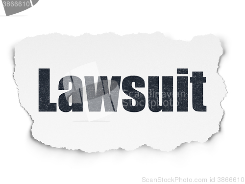 Image of Law concept: Lawsuit on Torn Paper background